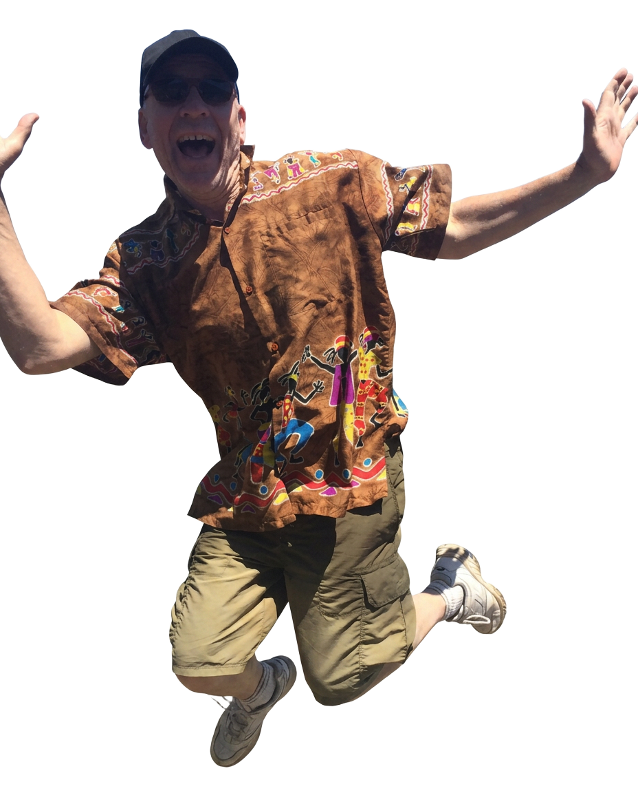 Doug York mid-jump, arms wide, clearly enjoying himself